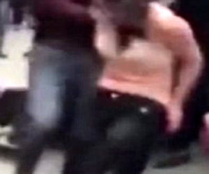Woman strips naked to save husband from police