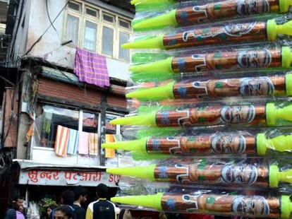 holi: modi pichkari in the market.