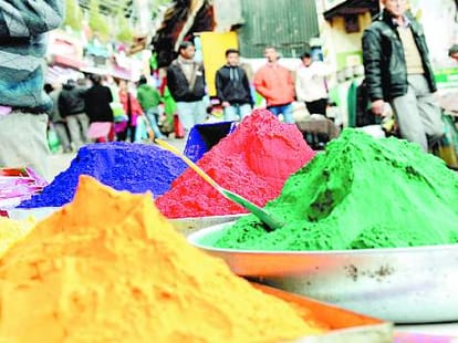 holi: modi pichkari in the market.