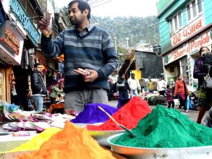holi: modi pichkari in the market.