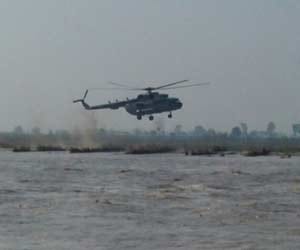 5 Farmers extracted by helicopter caught in river