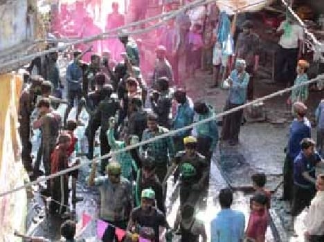 Holi bashes people faced
