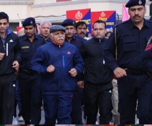 chief minister manohar lal khattar run along with policemen