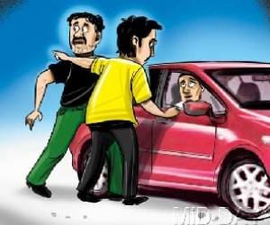unknown boys looted car, driver injured critically