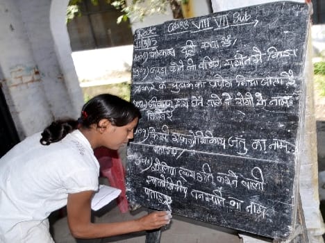 Questions were written on the board , pages written answer