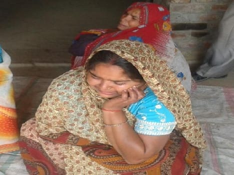Woman upset by beating suicides
