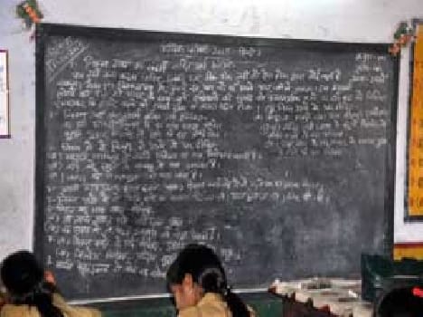 Question on blackboard, Students solve paper