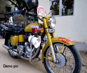 trouble for police when young man sitting on the patrolling bike