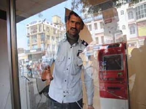 ATM vandalized , threw stones at shops