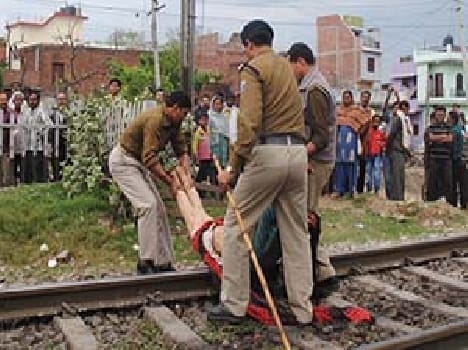 The woman lives by jumping in front of the train