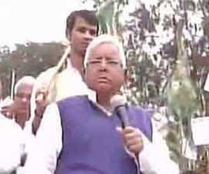 Lalu holds protest march against Land bill