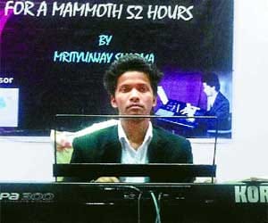 DU student made the 54-hour record by playing piano