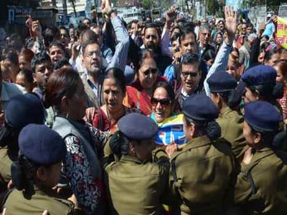 protest rally against dehradun private school.
