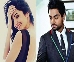 Virat kohali and Anushka sharma playing Tweet-Tweet