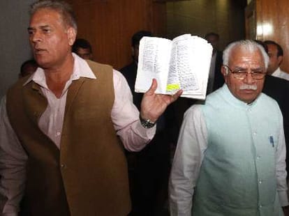 clash between congress and bjp mla in assembly