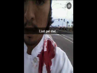 man kgot shot and took a selfie