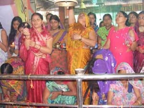 Devi temple devotees thronging crowd