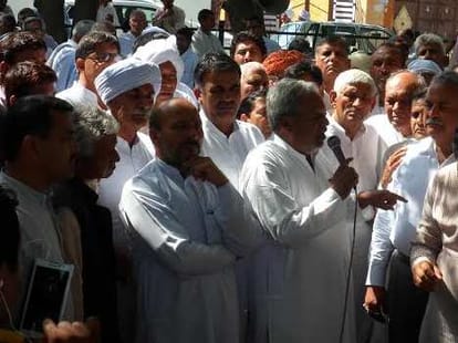 bloody confrontation in 2 villages in haryana , fiercely pelt stones
