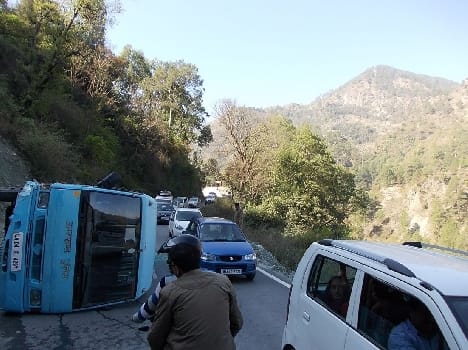 NH police van after being fired on brake failure, 26 injured