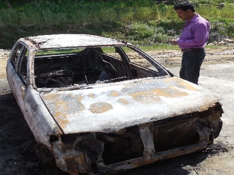 Set fire to the car of village head