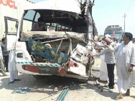 Passenger bus collided with a stand truck 