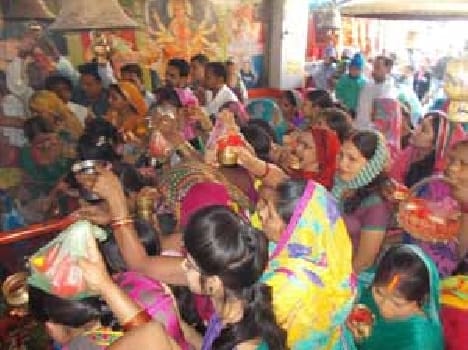  Devotees throng temples