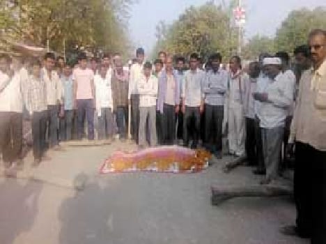 Woman on death road blockades