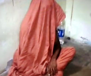 priest arrested before mausoleum.
