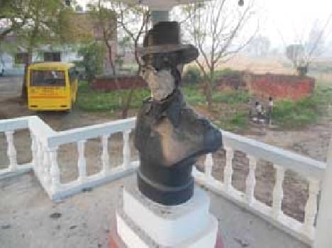 The damaged statue of martyr