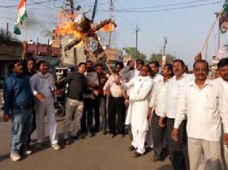 blew the effigy of Minister of State 