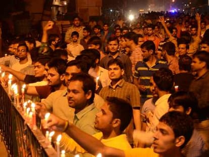 Students conduct candle march in Allahabad University.