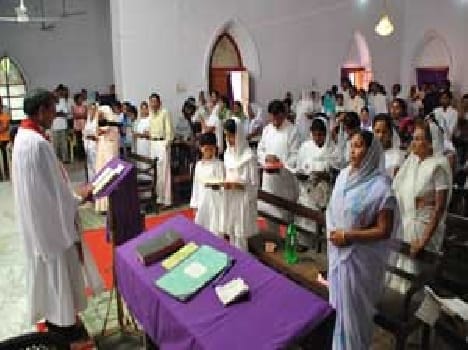 The priest gave a message of unity among the people.