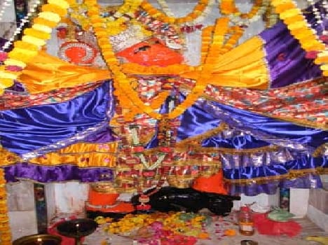 Engaged in the worship of Maruti Jaykare