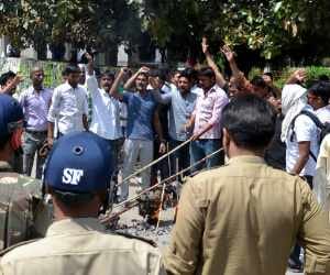 Students conduct candle march in Allahabad University.