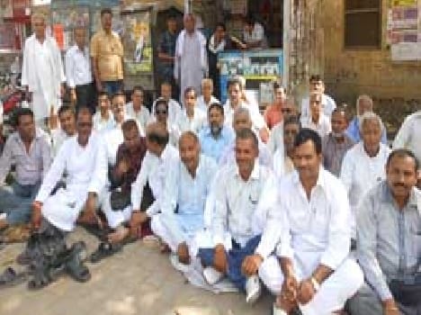on dharna to protest teacher evaluation .