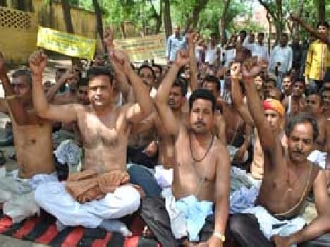 The teachers perform topless
