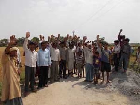 Villagers workers hostage