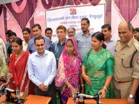 Sewing machines, bicycles distributed Trai