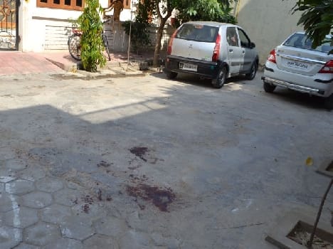 robber shoot security persion