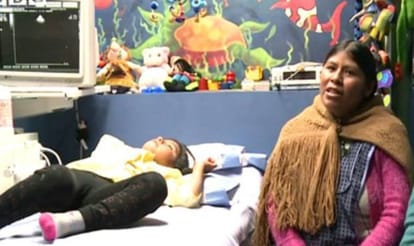 bolivian womne knits child heart