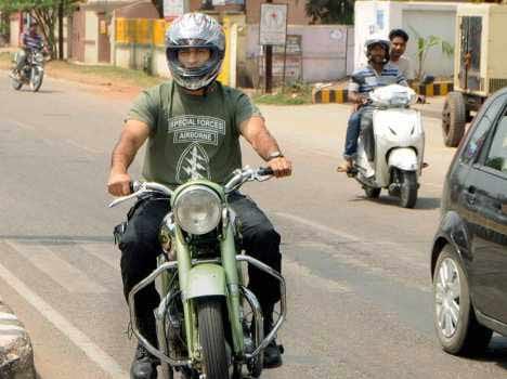 Dhoni fined challan of Rs 500