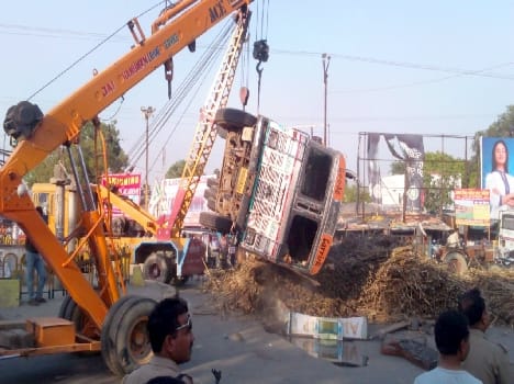 Overloaded truck flip Broken power pole