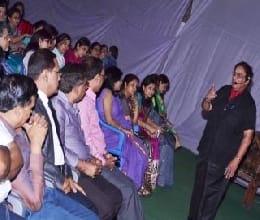 Teach strange way to live happier life