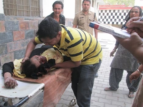 Woman sitting on the bike falls, death