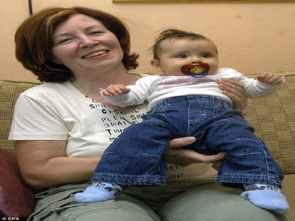 woman who is pregnant with quadruplets at 65