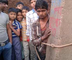 Was caught stealing from the pole shackled, beaten