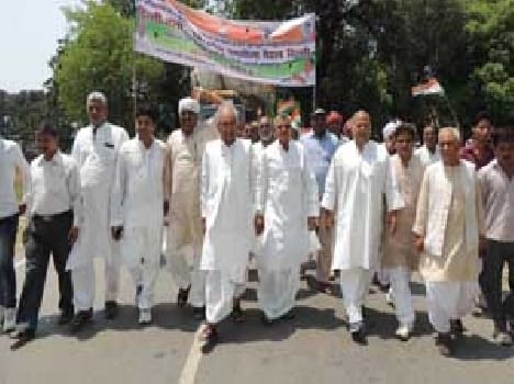 Walking out in protest against land acquisition bill