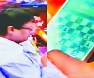 An officer was playing chess during a meet.