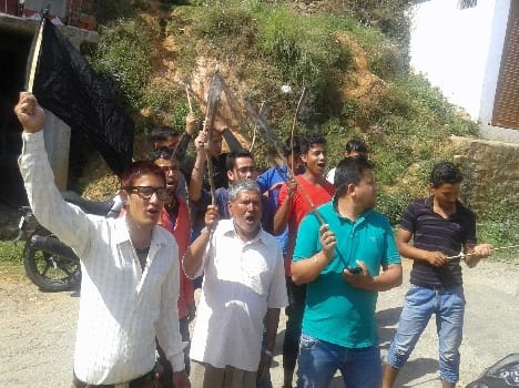 MLA Chufal shown black flags