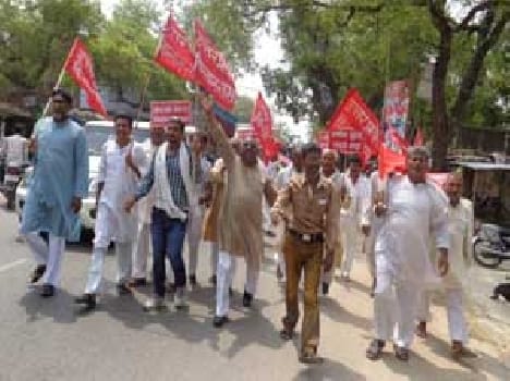 March out against land acquisition